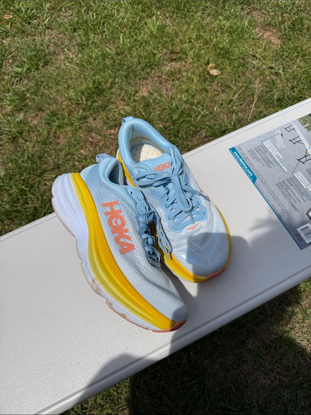 Hoka Women's Light Blue Running Shoes with Yellow Accents